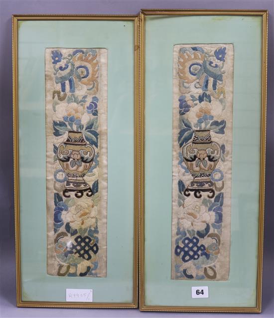 A pair of Chinese embroidered sleeve bands, framed 43 x 12cm